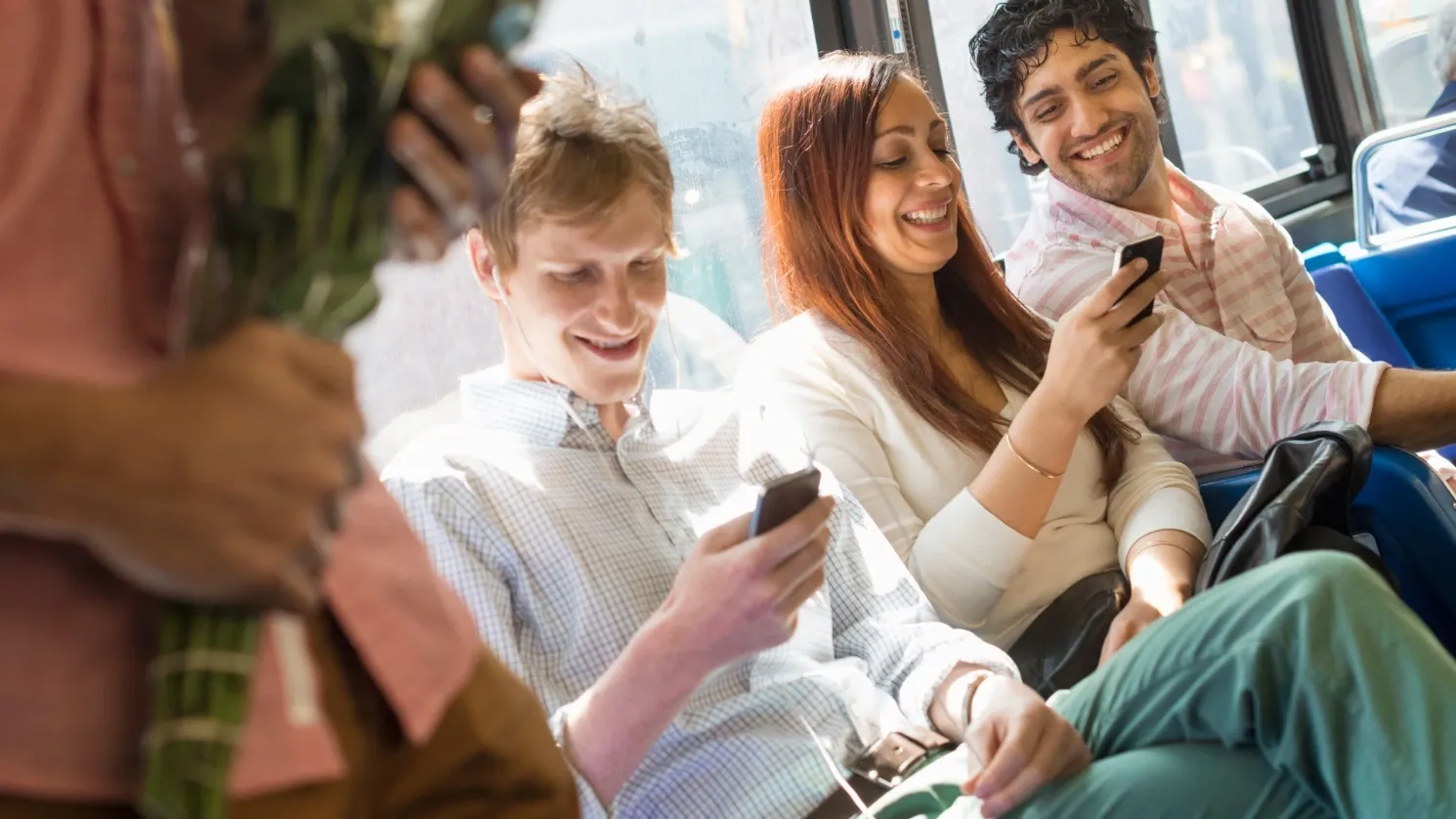 young people checking mobile phones