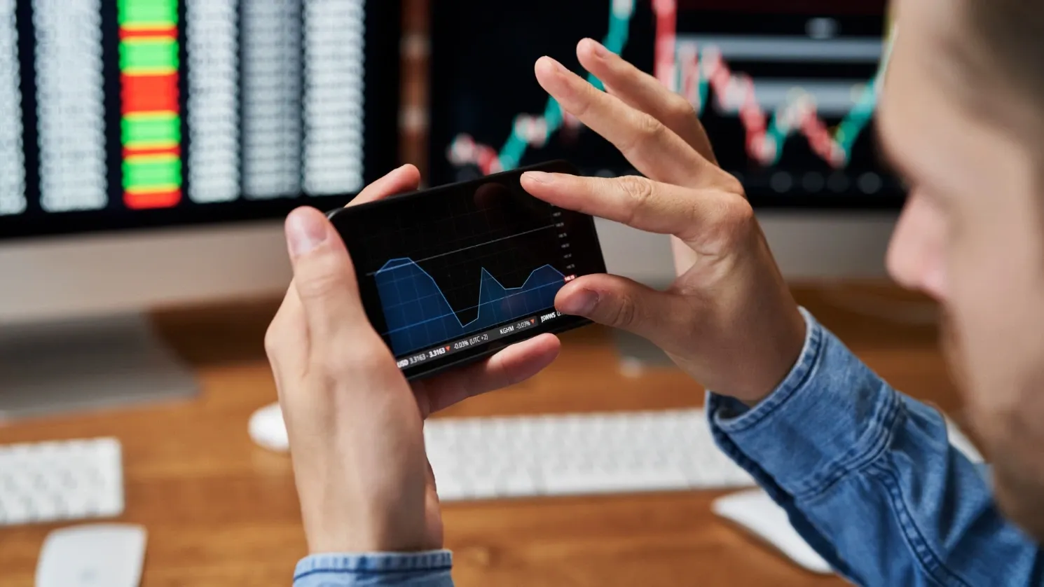 man viewing metrics on mobile